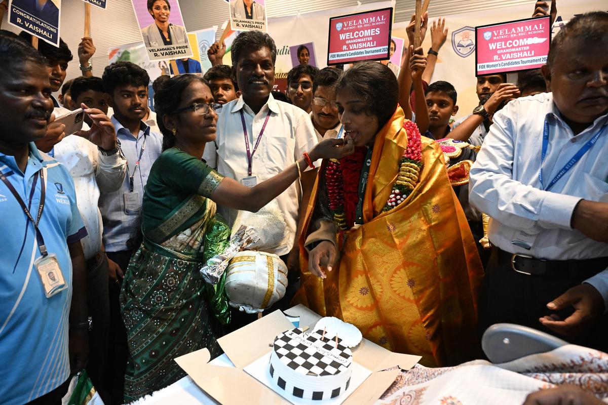 Women’s Candidates winner R. Vaishali returns home to lukewarm welcome in Chennai  After 14 rounds of draining, exacting chess, and a final-round victory over former World Rapid and Blitz champion Kateryna Lagno to win the FIDE Women’s Candidates 2026, Grandmaster R. Vaishali returned home in the early hours of Sunday.Despite the odd hour and the restrictions in place owing to the Tamil Nadu Assembly election week, the welcome was relatively subdued, though around 50 students from Velammal were still at the airport to receive her.Carrying placards with messages for the newly crowned challenger, they gathered to greet her, cut a cake and pose for photographs. Nearby stood Vaishali’s family. Her father, Rameshbabu, watched quietly from a corner, taking it all in, before Vaishali spotted him, rushed across and posed with her family and the winner’s medal. The Women’s Candidates remained open almost until the very end, and Vaishali’s patience and resilience saw her finally lift the title in Cyprus.
                                                            | Photo Credit: 
                                M. Srinath
                            

                            The Women’s Candidates remained open almost until the very end, and Vaishali’s patience and resilience saw her finally lift the title in Cyprus.
                                                            | Photo Credit: 
                                M. Srinath
                                                    For Vaishali, the moment completion of a full circle.Back in 2013, as a 12-year-old, she had been in attendance when Viswanathan Anand faced Magnus Carlsen in Chennai for the World Championship title. More than a decade later, she now finds herself on the verge of that same stage.“It is a dream moment for me. I’m very happy. I’ve followed many World Championship matches, and now I’ll be playing one. I’m really looking forward to it,” Vaishali told Sportstar on her arrival in the city.The Women’s Candidates remained open almost until the very end, with multiple players still in contention deep into the tournament.Going into the final round, Vaishali needed to beat Lagno, while Bibisara Assaubayeva, who eventually finished second, had to either lose or draw against fellow Indian Divya Deshmukh. Divya held Bibisara, leaving Vaishali needing a win over Lagno to clinch the title that very day.“Before the tournament, we had worked on different openings, and we had narrowed it down to two that we thought could come up in the final round. As expected, one of them did, and thankfully it worked out,” said Grandmaster M. Pranesh, who travelled with Vaishali as a sparring partner.The opening was the Sicilian Dragon. Lagno gave up a pawn early to generate attacking chances against Vaishali’s king, but Vaishali defended precisely, stayed calm under pressure and gradually turned the position in her favour, using her bishop actively to keep Lagno’s queen under watch.“It was a very close tournament. It could have gone either way, and I won the last game, which was very crucial in that situation,” Vaishali said.Her path to the title had been anything but smooth. Vaishali began with four consecutive draws and then suffered a loss to Zhu Jiner in Round 5. When the two met again in Round 12, Vaishali went in with a one-point lead, only to lose once more. Yet that defeat, paradoxically, would come to be seen by her camp as a turning point rather than a setback.“The second loss was actually crucial,” said coach R.B. Ramesh. “She went into Round 12 with a one-point lead and then lost to Zhu, which brought them level. I told her to treat it as if she had drawn the game, because she was still in joint lead going into Round 13 against Tan Zhongyi. The idea was to take it positively and move on.”Almost everyone around Vaishali in Cyprus echoed that view. The loss to Zhu did not derail her campaign. If anything, it released some of the tension that had built up around the burden of leading and allowed her to reset for the final push.Now comes the biggest match of her career: a World Championship clash against reigning champion Ju Wenjun. The two met at last year’s Norway Chess Women, where their classical game ended in a draw before Vaishali won the Armageddon tiebreak, her first victory over Ju in any format. R. Vaishali’s challenges will only go steeper from here, for her next big match is against reigning world champion Ju Wenjun.
                                                            | Photo Credit: 
                                M. Srinath
                            

                            R. Vaishali’s challenges will only go steeper from here, for her next big match is against reigning world champion Ju Wenjun.
                                                            | Photo Credit: 
                                M. Srinath
                                                    “I have played only a few classical games against her, and I’m very excited to face her for the title next,” Vaishali said.For Ramesh and the team around her, the scale of what lies ahead is still sinking in. Planning, he said, will begin soon, with discussions around building a support team, identifying areas of improvement and deciding the structure of the training camp, likely from the first week of May.“It will be her first match on such a big stage, and even for all of us it will be a new experience,” Ramesh said. “We will take suggestions from experienced people around us, listen to feedback and then move forward from there.”Published on Apr 19, 2026  #Womens #Candidates #winner #Vaishali #returns #home #lukewarm #Chennai