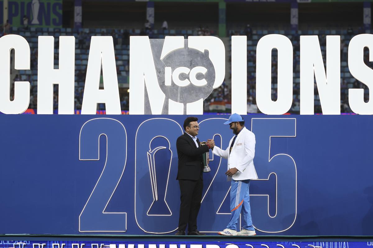 India’s captain Rohit Sharma receives the winners trophy from ICC Chairman Jay Shah during the presentation ceremony of the ICC Champions Trophy.