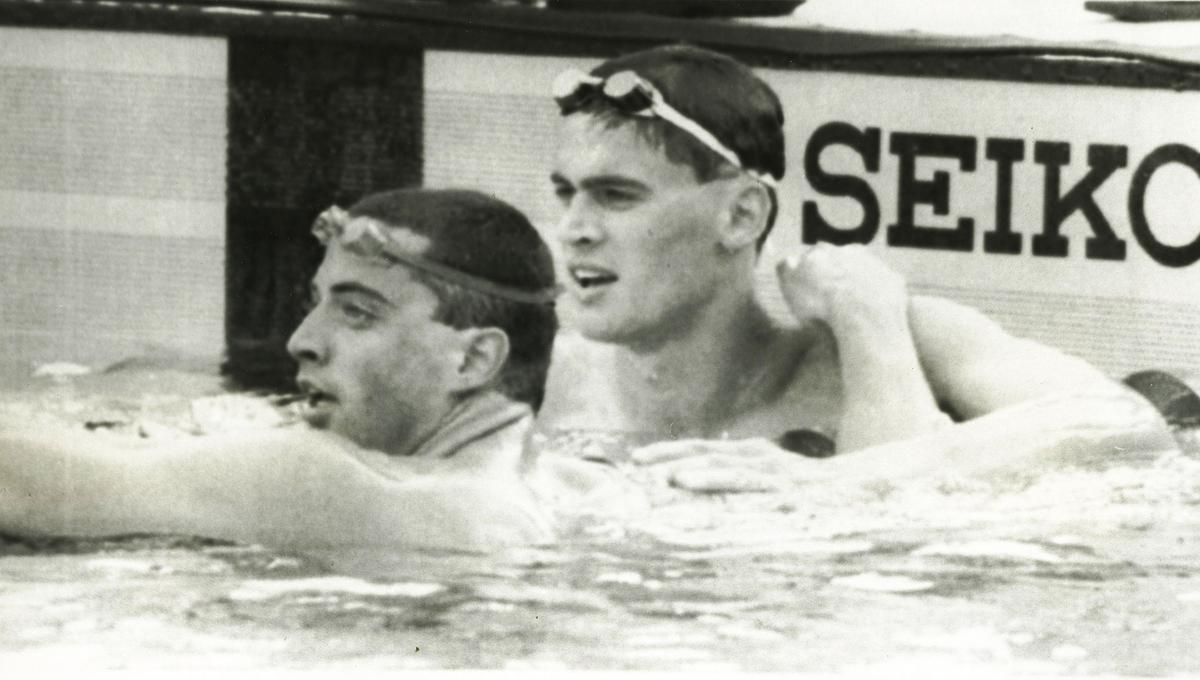 Alexandre Popov (right) of the Unified Team is joined by Matt Biondi of the USA, after the 50m swimming competition, in Barcelona on July 31, 1992. Popov won the gold setting a new Olympic record with a time of 21.91s. Biondi took the silver.
PHOTO: 