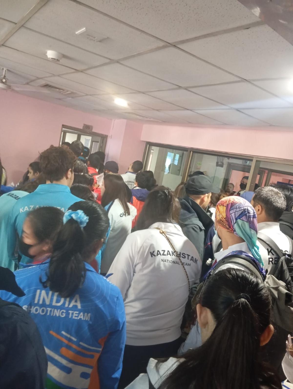 Athletes waiting outside the equipment control roomto get their gear cleared. 