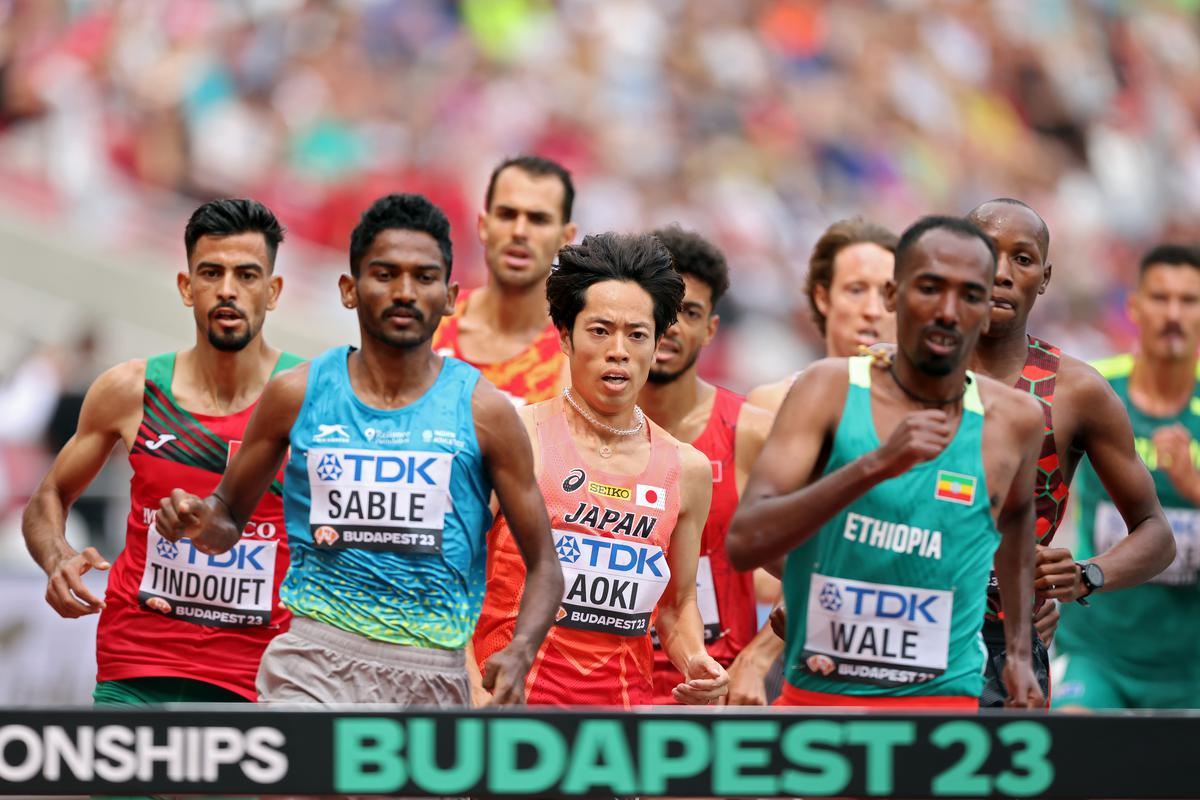 India’s Avinash Mukund Sable (Left), Japan’s Ryoma Aoki (center) and Ethiopia’s Getnet Wale (Right) competes in Men’s 3000m Steeplechase during the World Athletics Championships at National Athletics Centre on August 19, 2023 in Budapest, Hungary. 