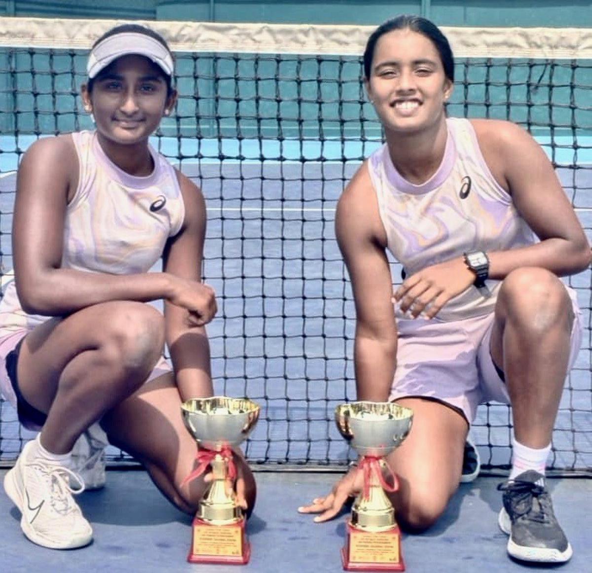 Doubles champions Harithashree Venkatesh and Diya Ramesh in
the ITF junior tennis tournament in Dehradun on Friday. 