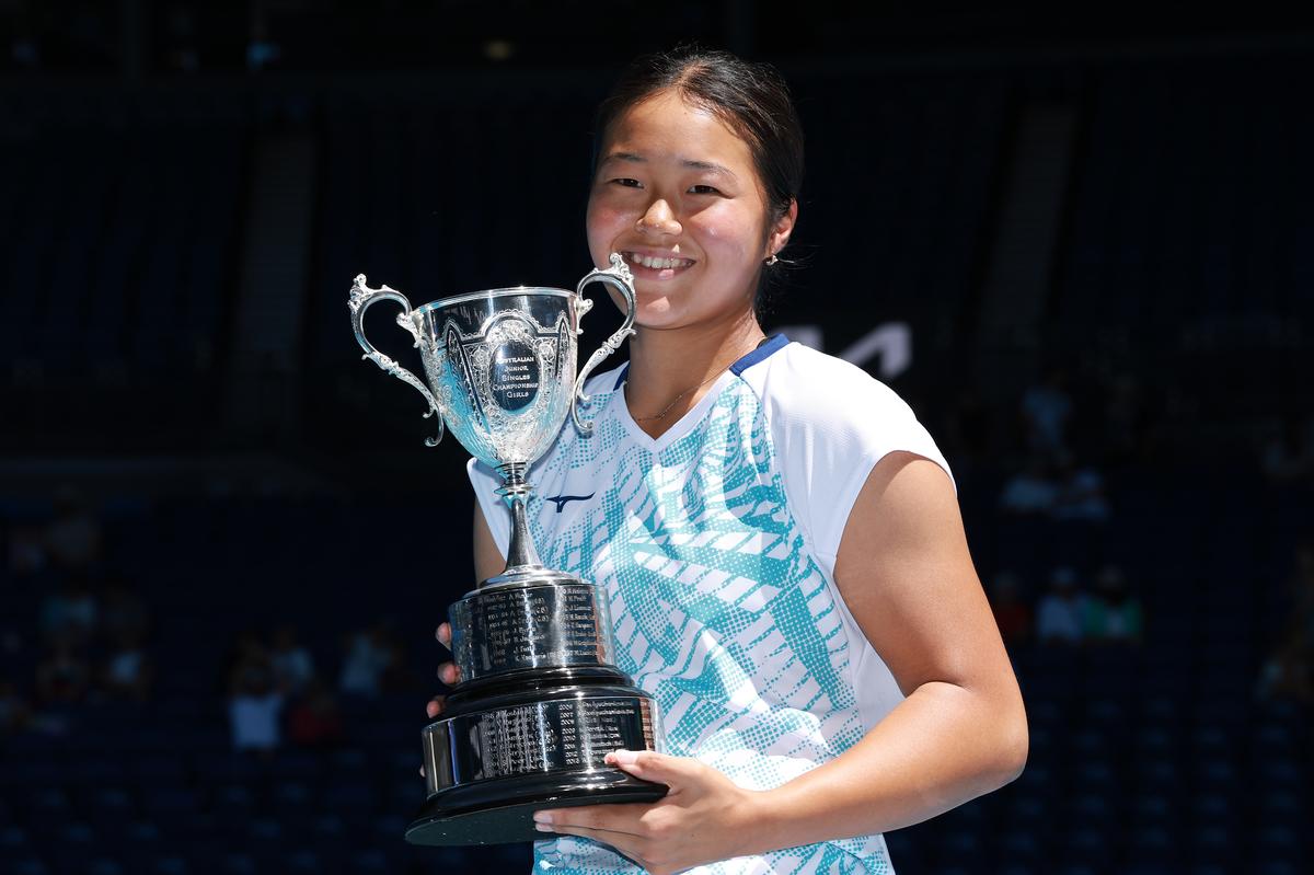 Winner Wakana Sonobe of Japan poses with the trophy after the Junior Girls’ Singles Final against Kristina Penickova of the United States.