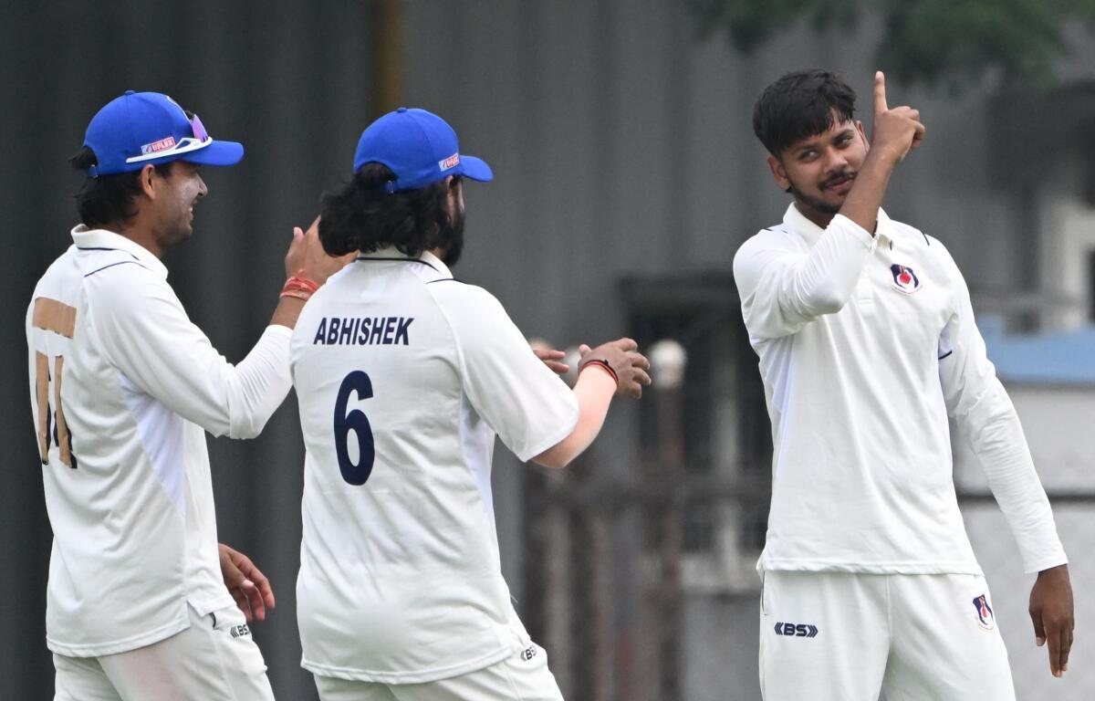 ttar Pradesh’s Kartik Yadav celebrates a wicket against Tamil Nadu.