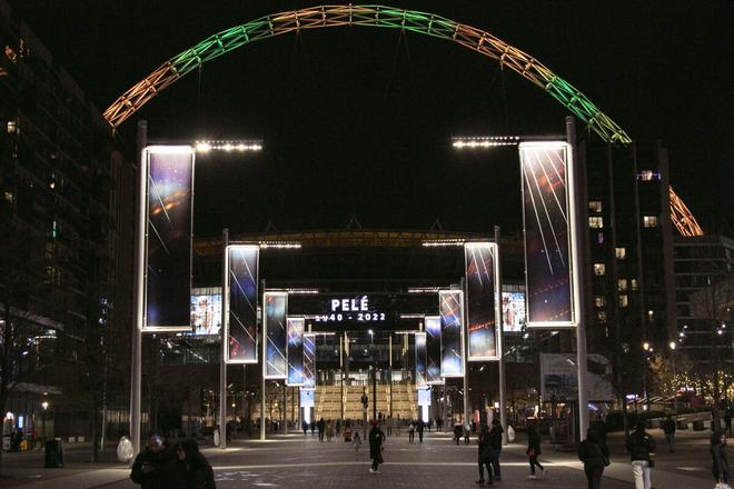 Wembley Stadium’s arch was lit up in the colours of Brazil after it was announced that the former Brazilian footballer Pele had died. Edson Arantes do Nascimento, known as Pele, the Brazilian king of soccer who won a record three World Cups and became one of the most commanding sports figures of the last century, died in Sao Paulo. He was 82.