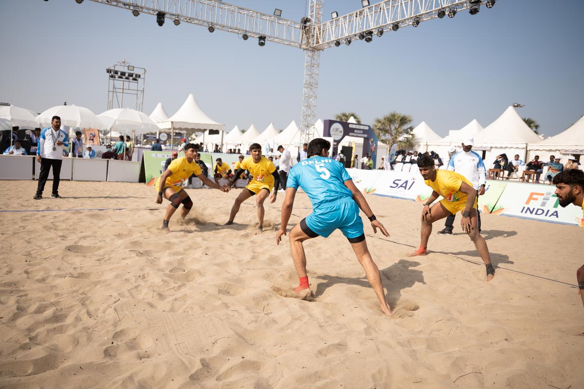 Beach kabaddi players in action at the Khelo India Beach Games 2026 on Ghoghla Beach in Diu.