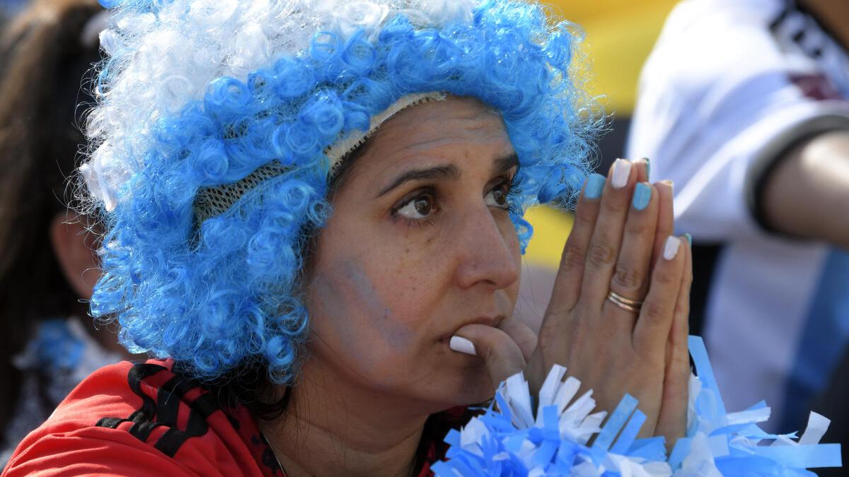 Argentina fans react after the two-time FIFA World Cup winners lose to lower ranked Saudi Arabia