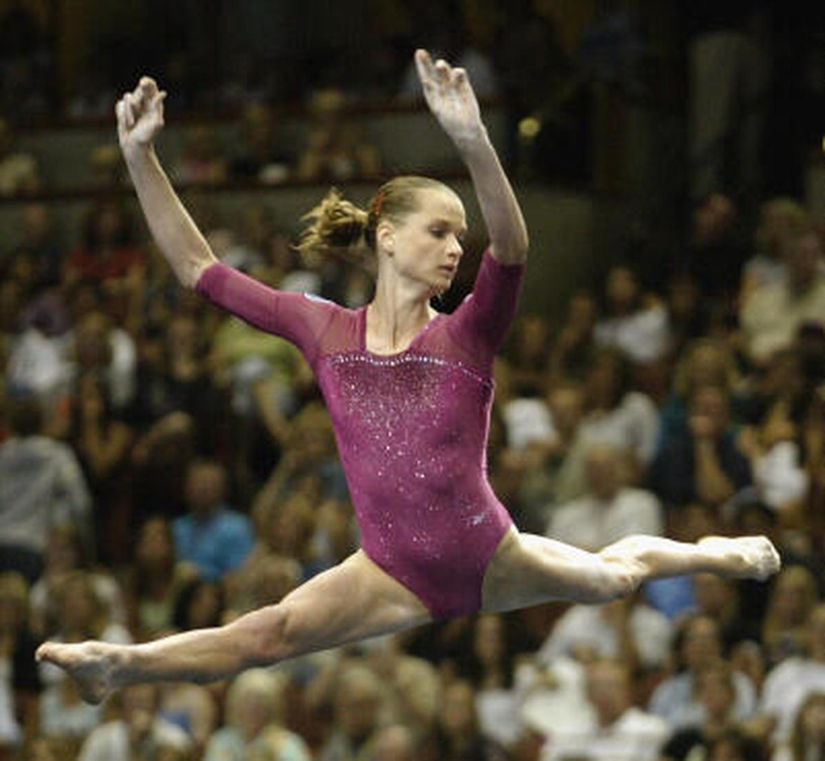 Svetlana Khorkina of Russia leaps in the floor exercise.