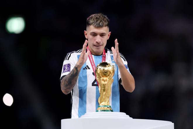 File Photo: Lisandro Martinez of Argentina poses for a photo with the FIFA World Cup winning trophy during the award ceremony following the FIFA World Cup Qatar 2022 Final match between Argentina and France at Lusail Stadium.