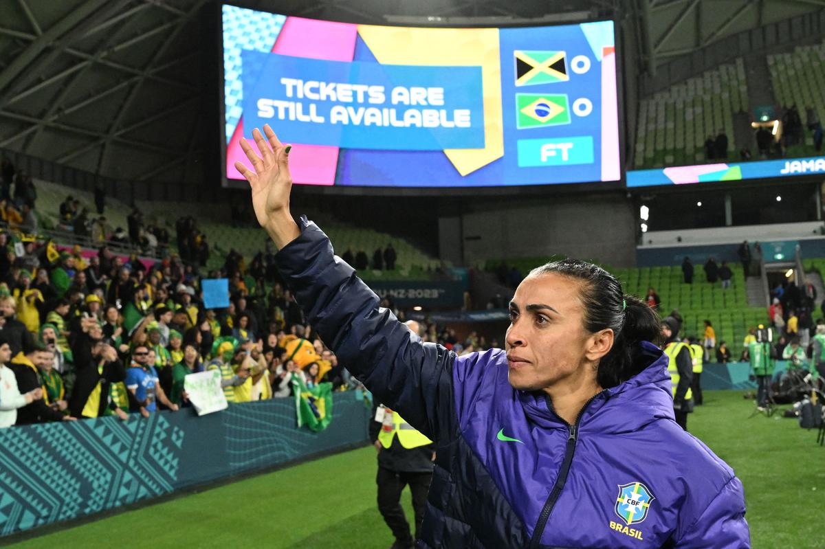 Brazil’s forward #10 Marta waves to the crowd. 