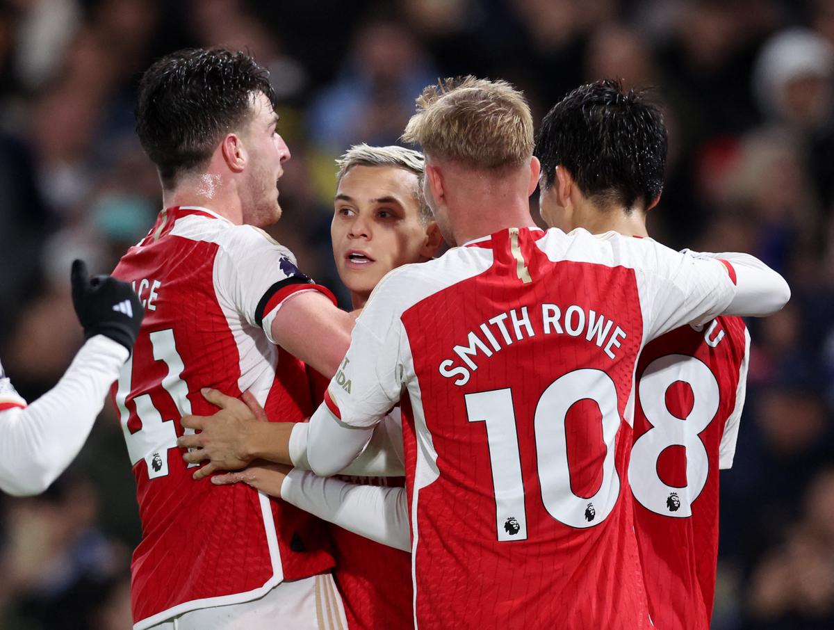 Arsenal’s Leandro Trossard celebrates scoring its second goal with Declan Rice, Emile Smith Rowe and Takehiro Tomiyasu. 