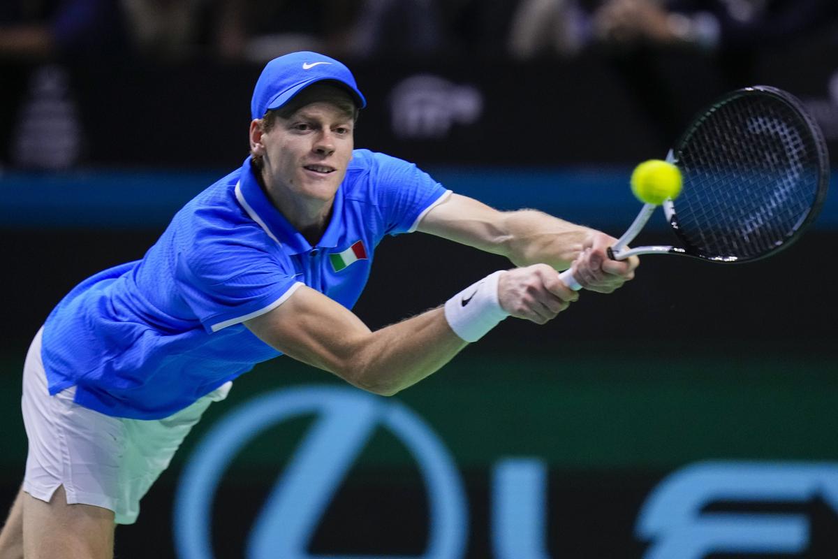 Italy's Jannik Sinner returns the ball to Netherlands' Tallon Griekspoor during the Davis Cup final tennis match between Netherlands and Italy at the Martin Carpena Sports Hall in Malaga, southern Spain, Sunday, Nov. 24, 2024. AP/PTI(AP11_25_2024_000005B)