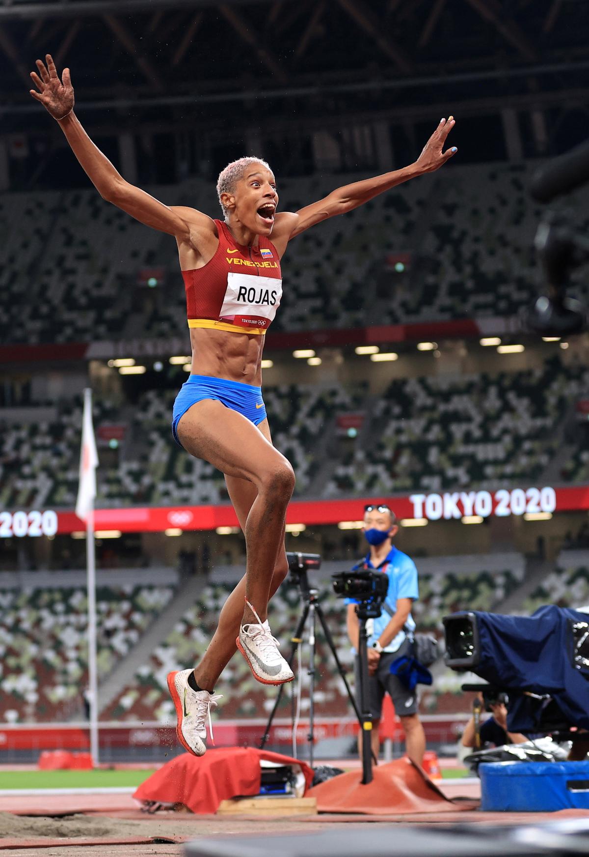 Yulimar Rojas of Venezuela celebrates after winning the gold medal.