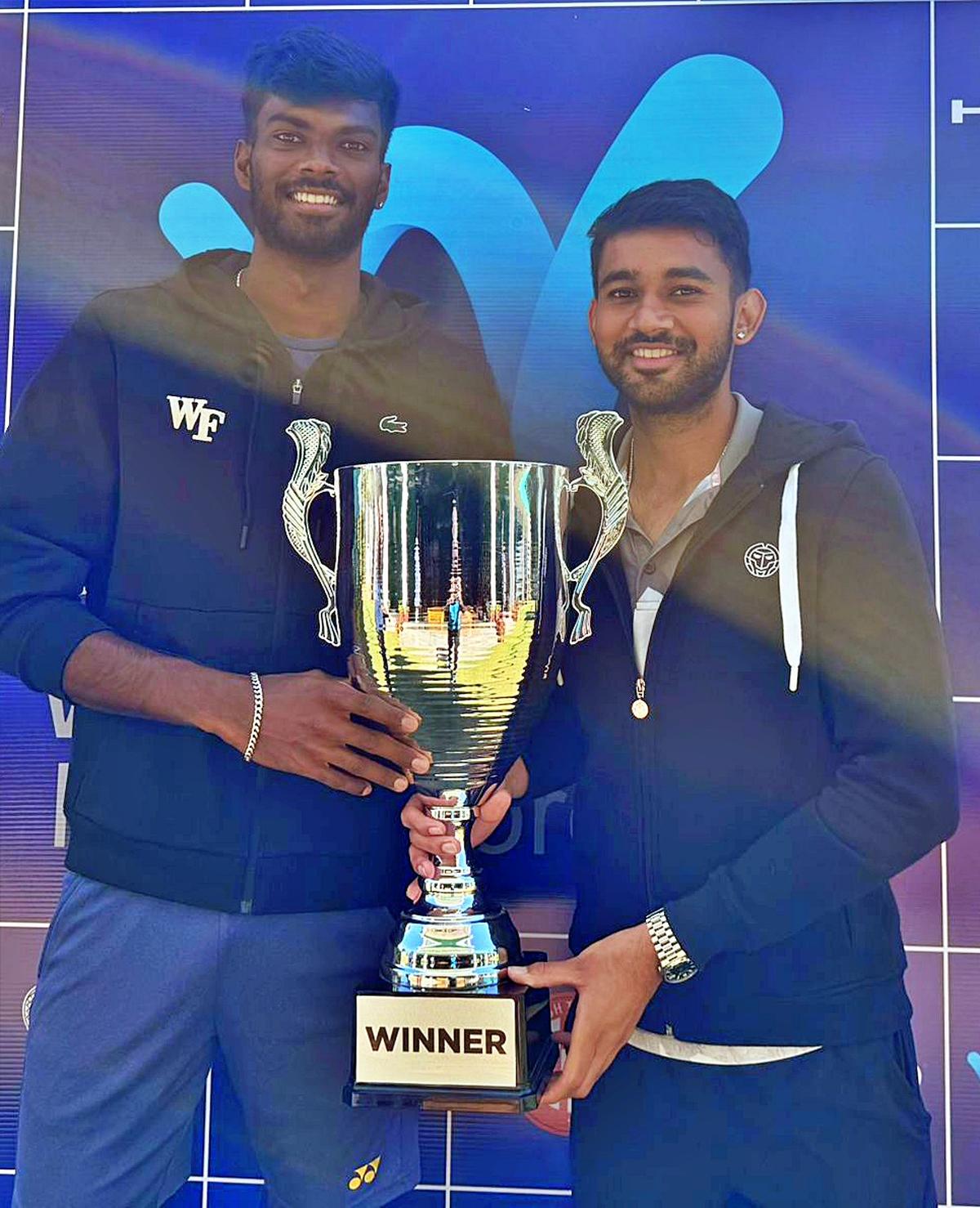 Dhakshineswar Suresh and Parikshit Somani, the doubles champions in the ITF men’s tennis tournament in Indore on Saturday.