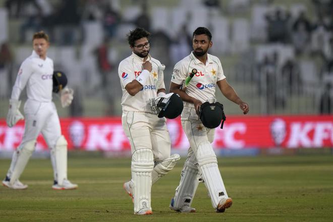 Pakistan’s Abdullah Shafique (right) and Imam-ul-Haq at the end of the second day. 