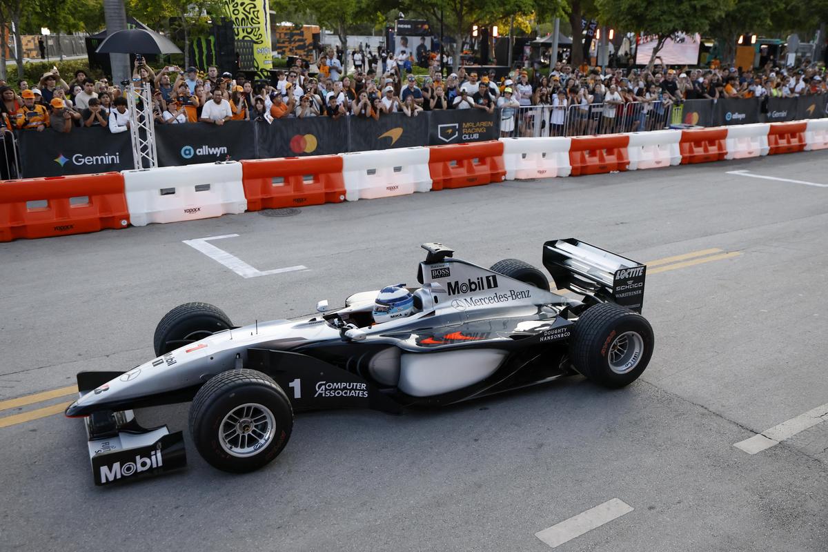 Two-time champion Mika Hakkinen in his V10-powered MP4-14 during the event.
