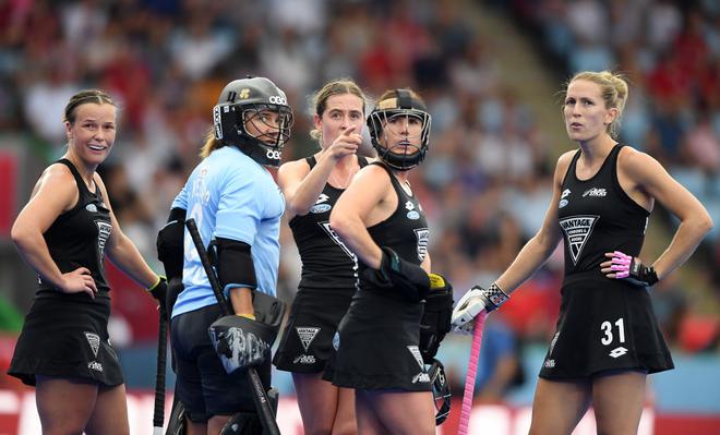 Members of the New Zealand team wait for the result of a referral during the Women’s FIH Field Hockey Pro League.