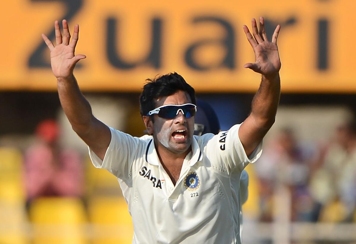 Indiaâs RavichandranÂ AshwinÂ successfully appeals for Jonathan Trottâs wicket on the second day of the first Test against EnglandÂ at the Sardar Patel Stadium in Motera in November 2012. 