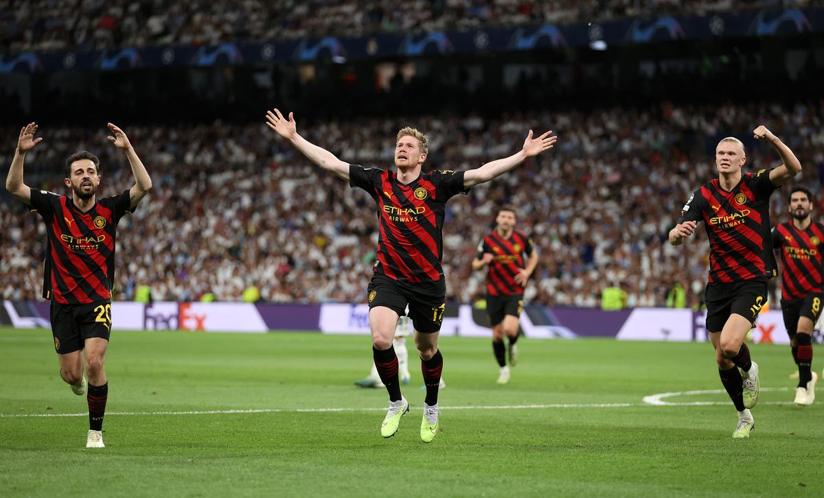 Kevin De Bruyne of Manchester City celebrates after scoring the team’s first goal during the UEFA Champions League semi-final first leg match between Real Madrid and Manchester City FC at Estadio Santiago Bernabeu on May 09, 2023 in Madrid, Spain. 