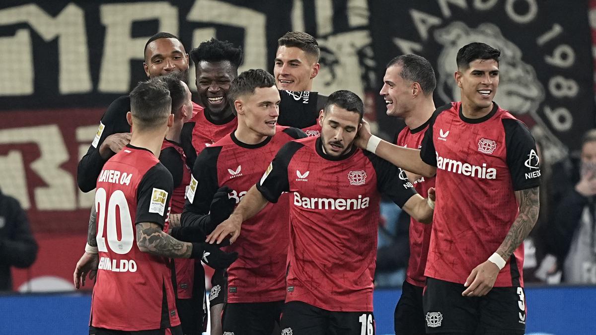 Bundesliga 2024-25: Ten-man Leverkusen beats Hoffenheim to stay close to leader Bayern Munich