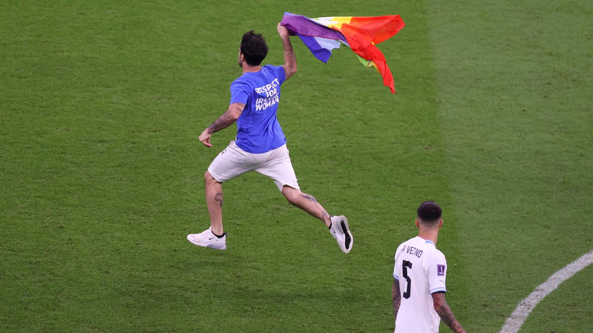 Pitch Invader with Rainbow Flag Interrupts World Cup Match