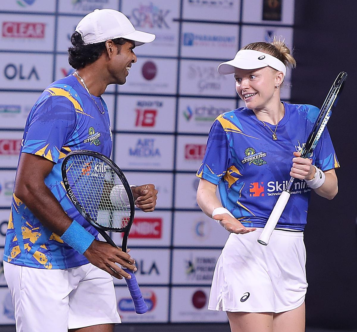 Vishnu Vardhan and Harriet Dart during their mixed doubles match for Hyderabad Strikers against Yash Mumbai Eagles in the TPL in Mumbai on Thursday.