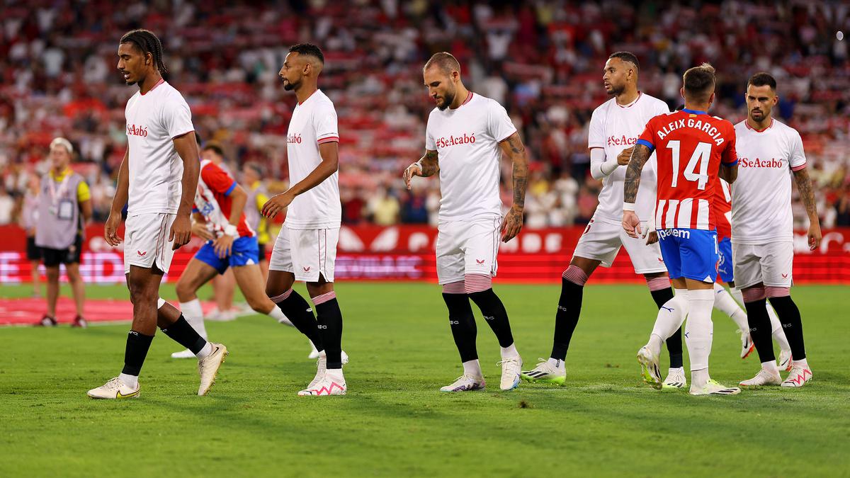 Sevilla supports woman player kissed by Spanish federation boss with T-shirts before game