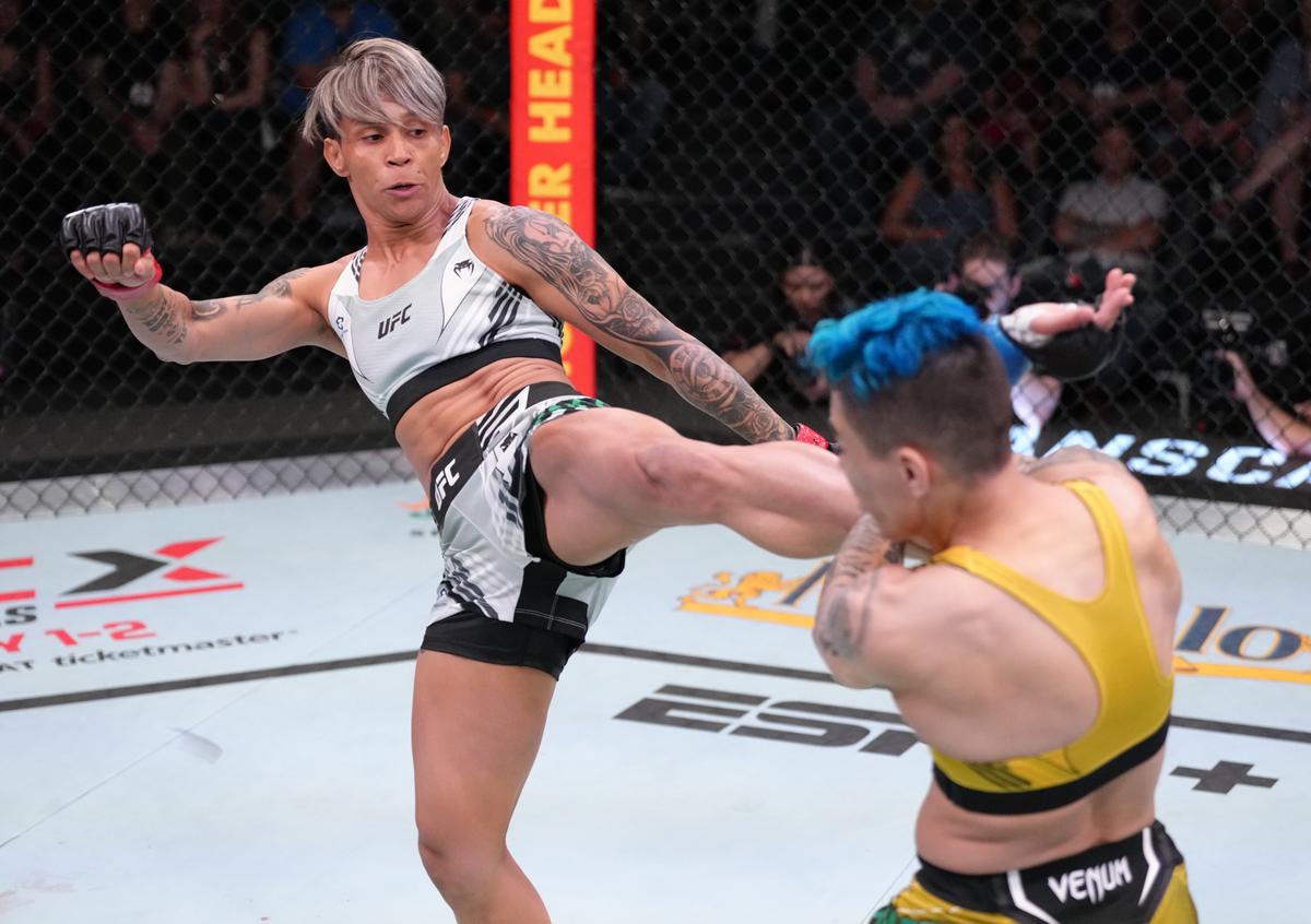 (L-R) - Amanda Lemos of Brazil kicks Jessica Andrade of Brazil in a strawweight fight during the UFC Fight Night event at UFC APEX on April 23, 2022 in Las Vegas, Nevada.