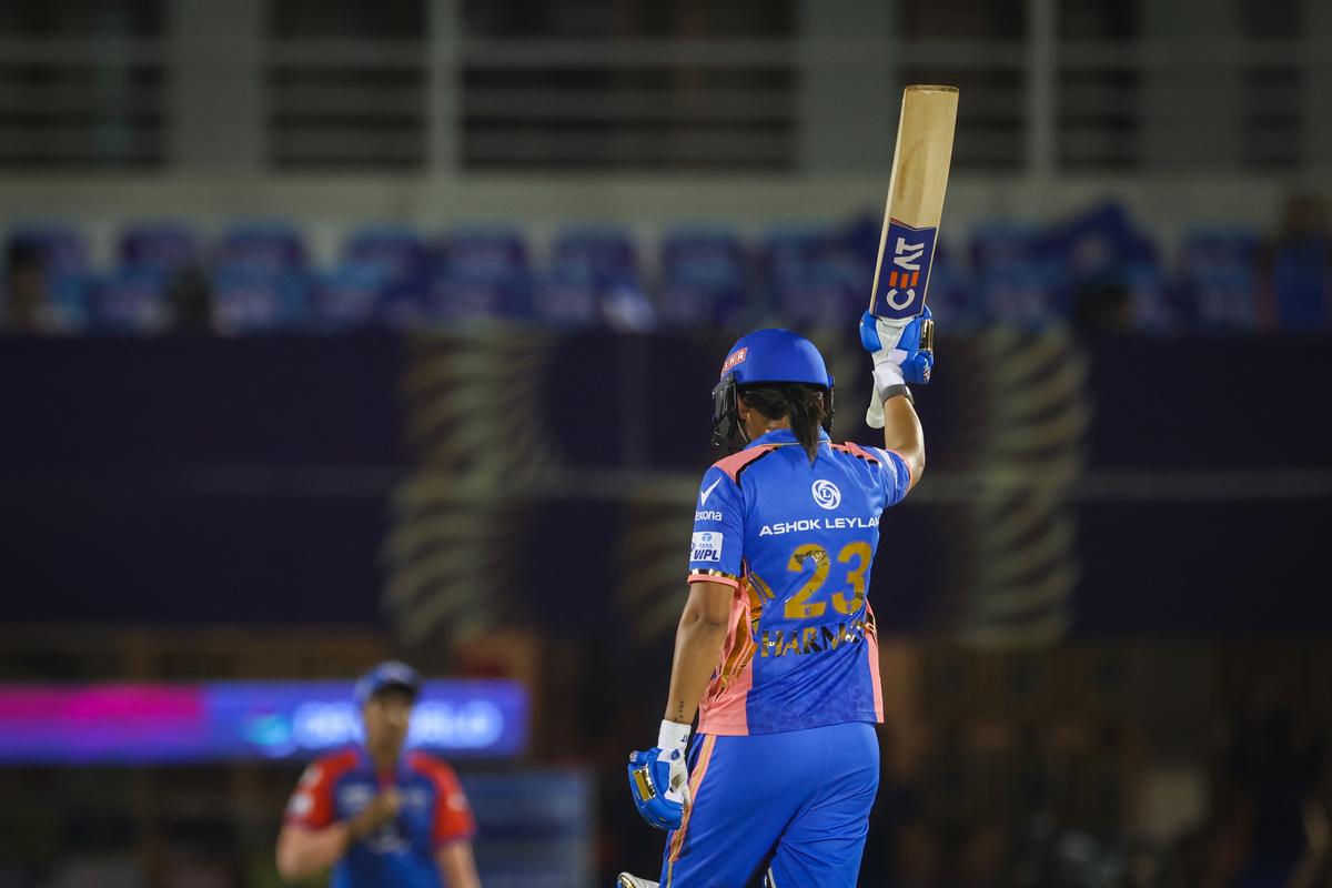 Harmanpreet Kaur of Mumbai Indians celebrates scoring a half-century during the WPL Final match between Mumbai Indians and Delhi Capitals at Brabourne Stadium on March 15, 2025 in Mumbai, India.