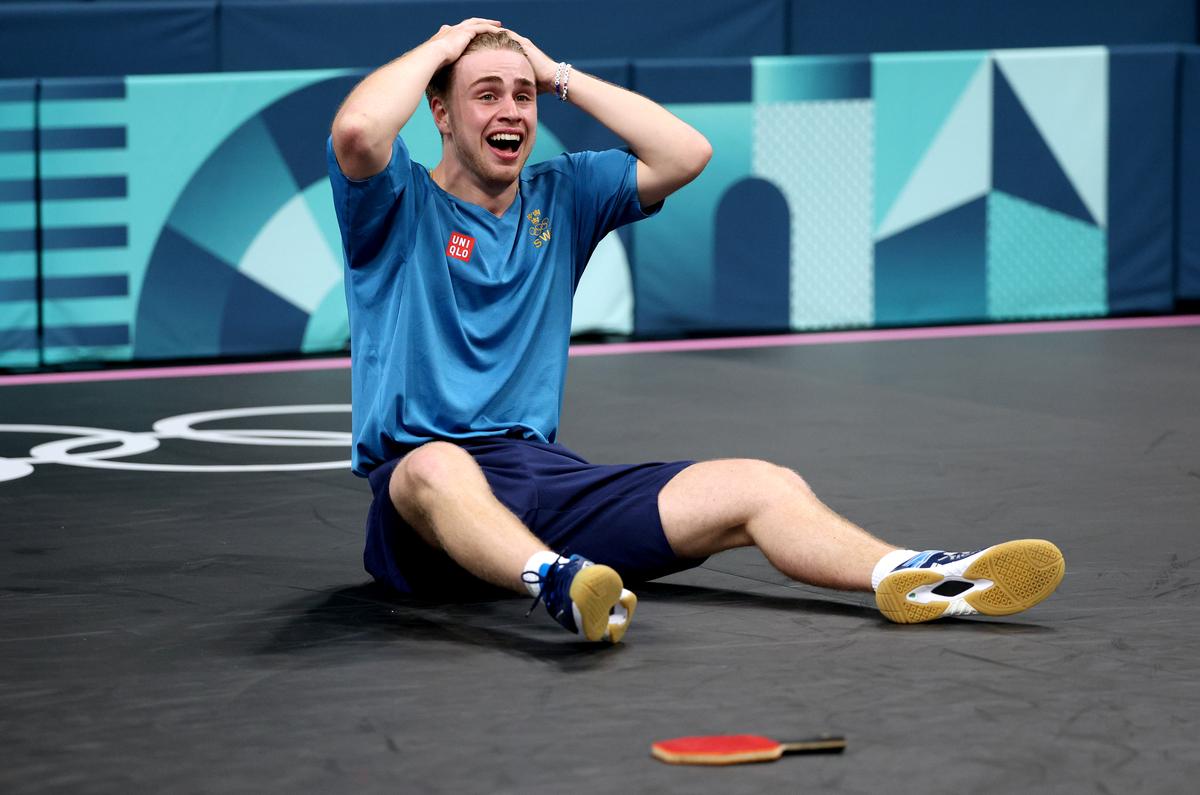 Truls Moregard of Sweden reacts after defeating Chuqin Wang of China during the Men’s Singles Round of 32 match.