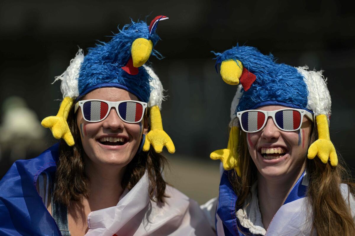 French supporters look on ahead of the men’s Rugby Sevens matches during the Paris 2024 Olympic Games at the Stade de France. 