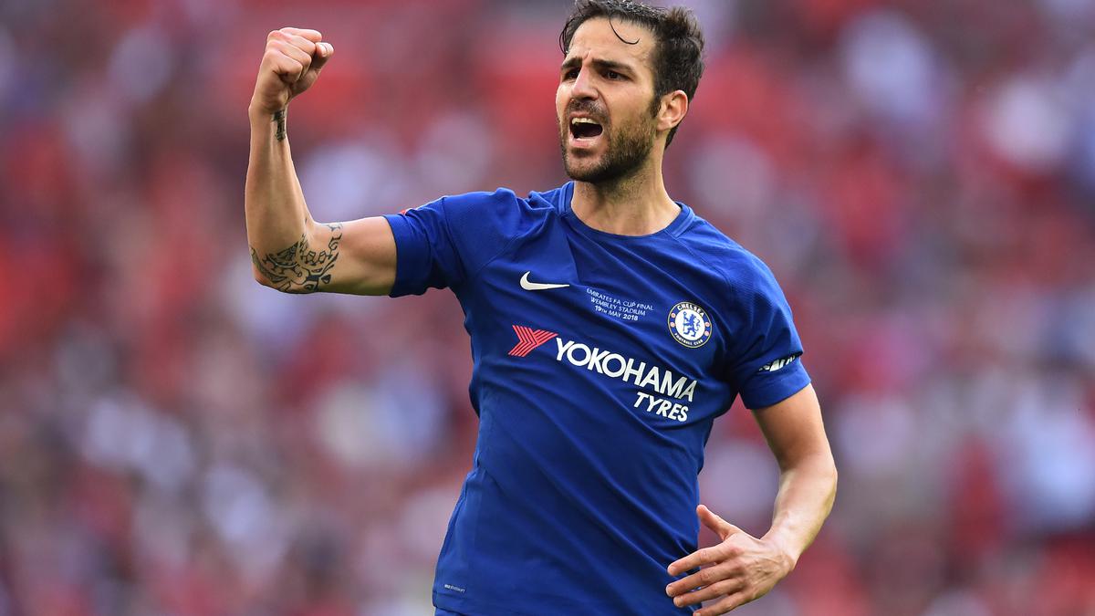 Former Spain midfielder Fabregas retires to take up coaching