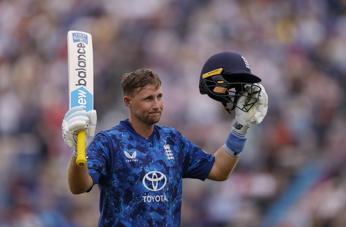 England’s Joe Root celebrates after completing his century.