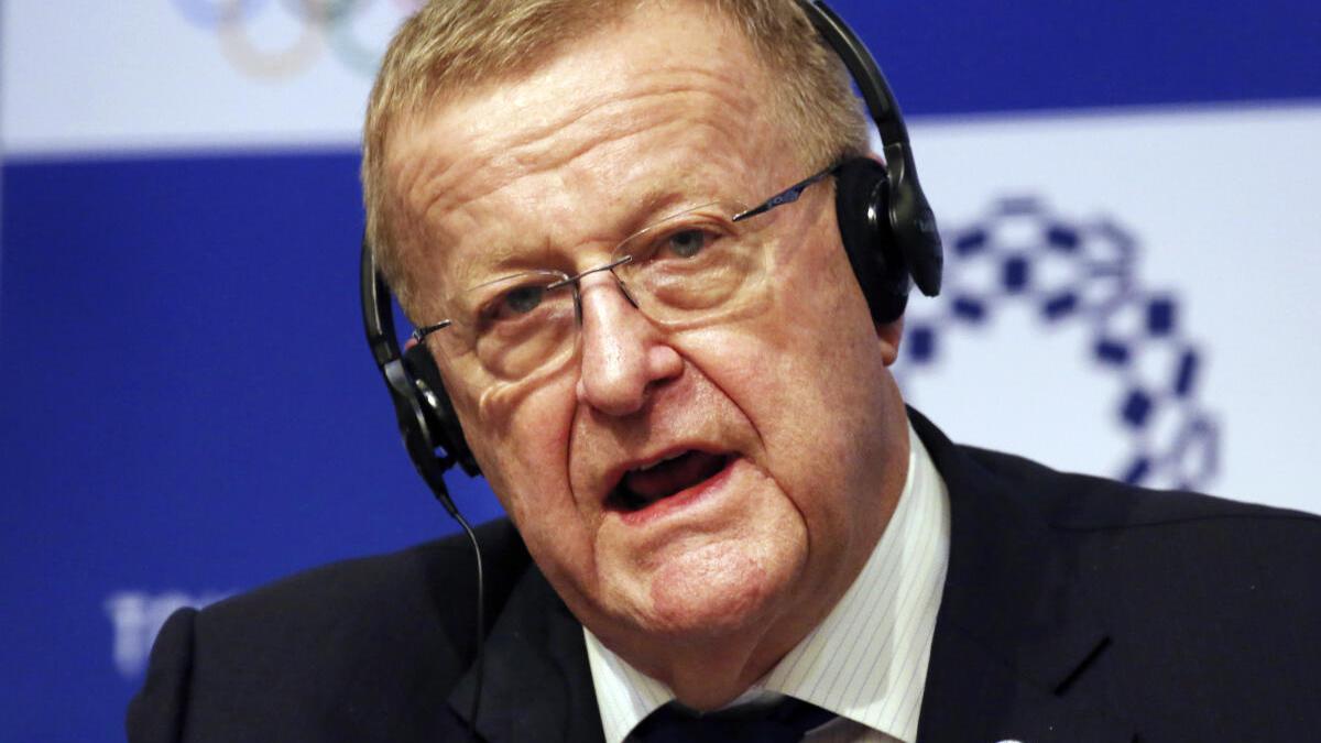 John Coates gets backlash for saying Olympics are on, no matter virus