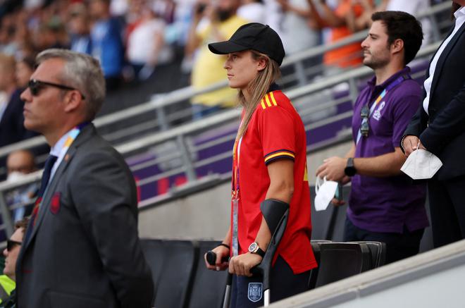 Spain’s Alexia Putellas watches on crutches in the stands before the EURO 2022 match.