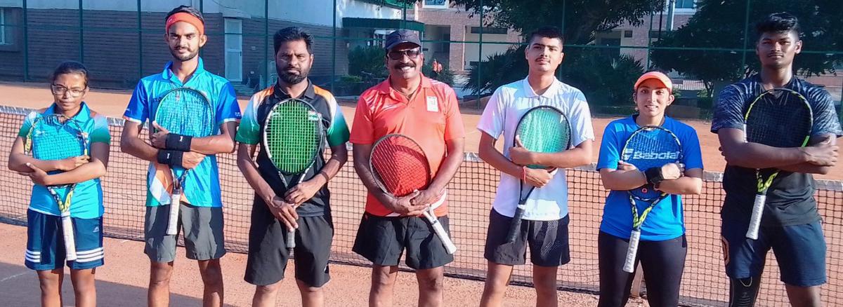 The Indian team for the World Deaf Tennis Championship at the National Stadium in Delhi, on the eve of its departure for Greece, on Wednesday.
