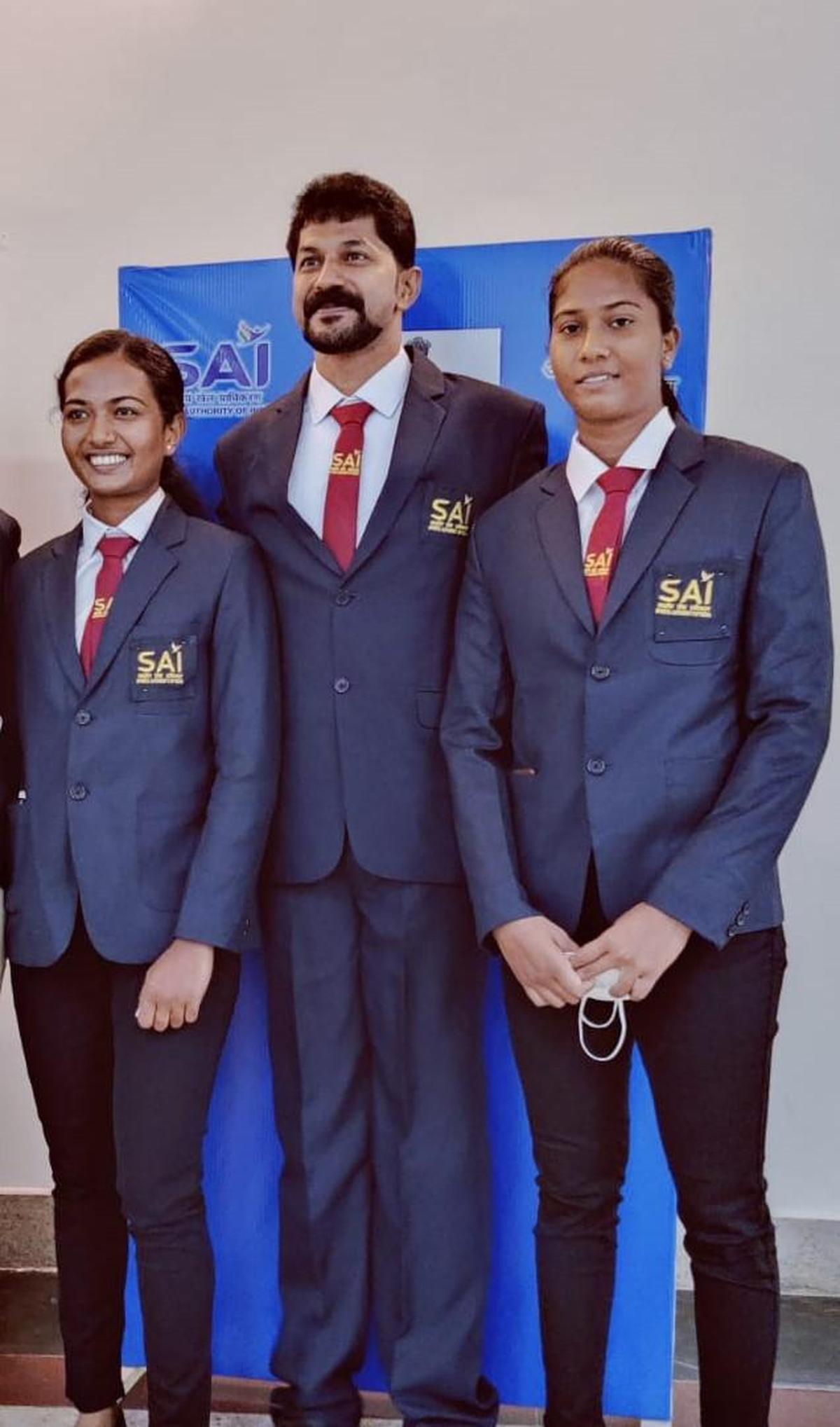 P. T. Paulose with his wards Meenakshy V. S. and Aswathy P. B. at SAI NCoE-Alleppey.