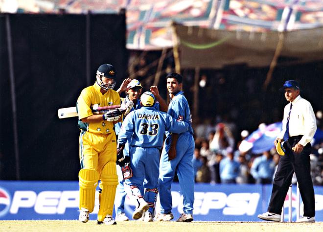 Ganguly of India and Waugh exchange a few rods as Steve Waugh leaves caught by Tendulkar.