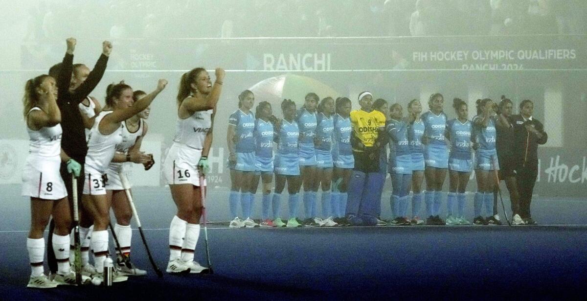 Germany players react during the penalty shootout win against India in the semifinal.