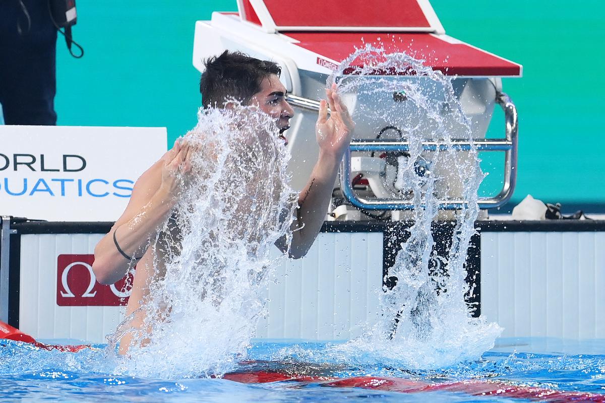 Diogo Matos Ribeiro after winning gold in the men’s 100m butterfly final at the Doha 2024 World Aquatics Championships.