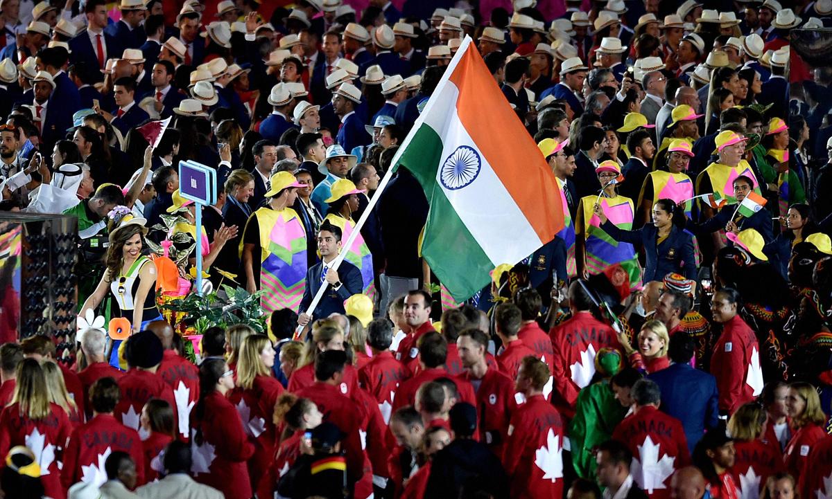 Abhinav Bindra carries the Indian flag during the Indian contingent march at the 2016 opening ceremony. 