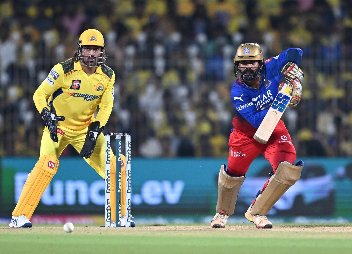 RCB’s Dinesh Karthik plays a shot against Chennai Super Kings. 