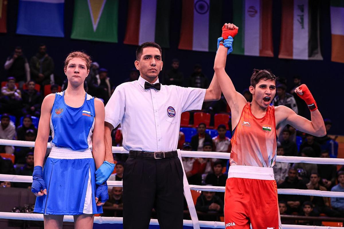 Nisha (R) after winning a bout during the junior World Championships.