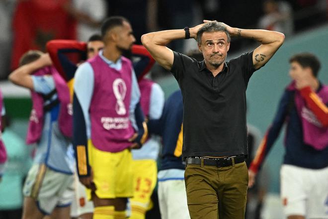 Spain coach Luis Enrique reacts after his team loses to Morocco in the FIFA World Cup Qatar 2022 Round of 16 clash in a penalty shootout.