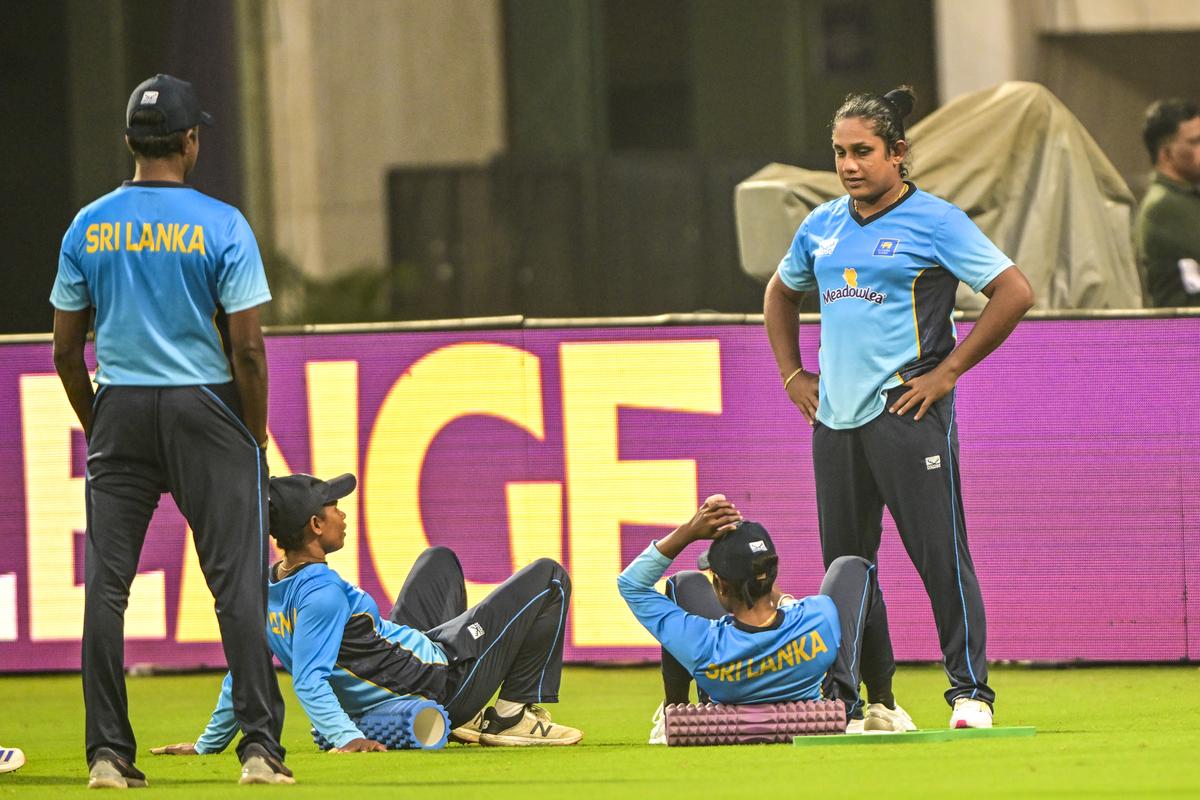 Sri Lanka’s captain Chamari Athapaththu (R) during a practice session ahead of her side’s match against Bangladesh in Navi Mumbai.
