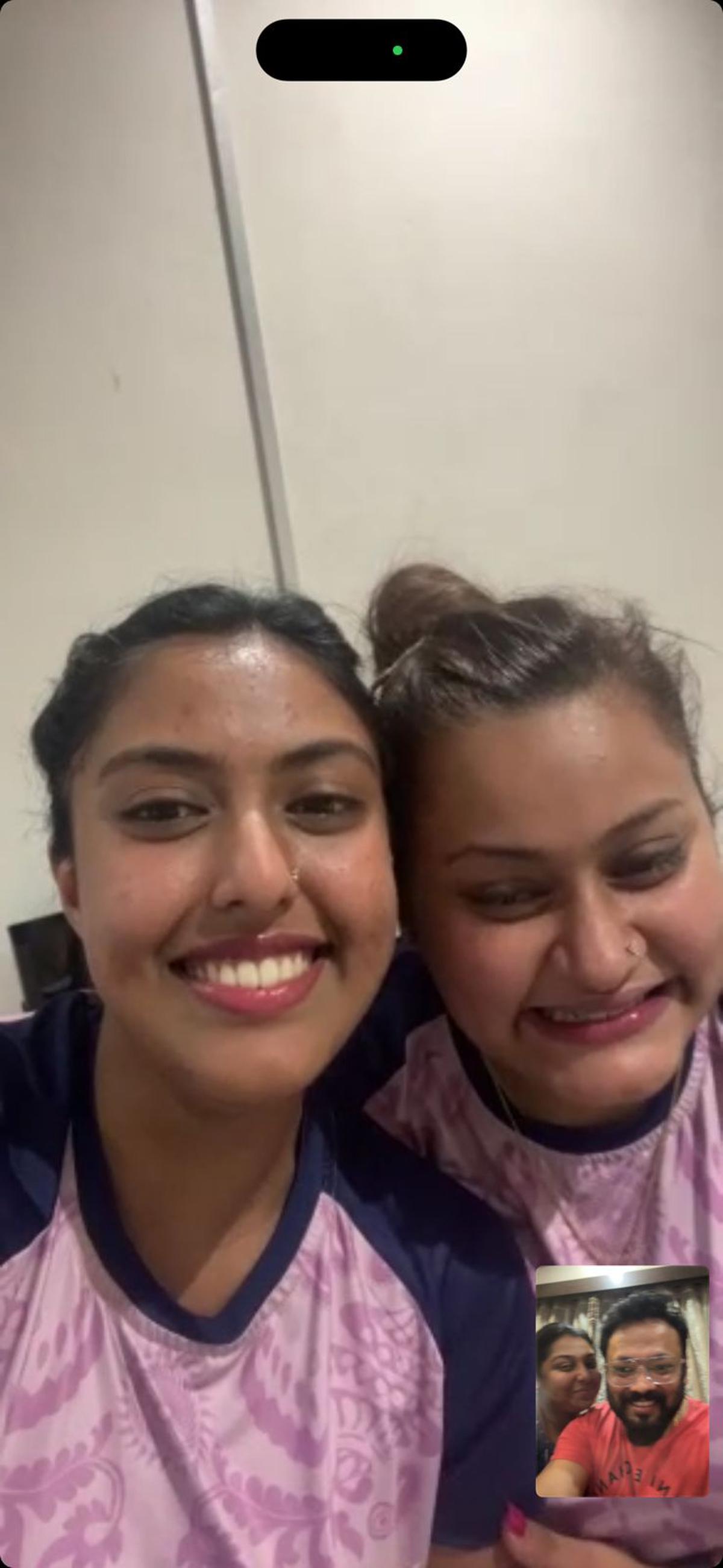 Ayhika and Sutirtha on a video call with their coach Soumyadeep Roy after their win over the Chinese duo in the Asian Games.