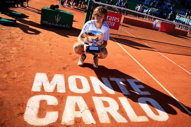 Russia’s Andrey Rublev celebrates with his trophy after winning the final Monte-Carlo ATP Masters Series tournament tennis match against Denmark’s Holger Rune.