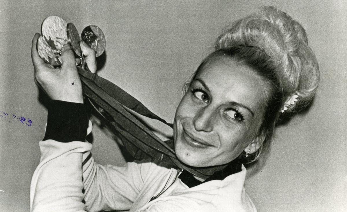 Czechoslovakia’s Vera Caslavska proudly shows the four medals she won at the 19th Olympic Games.