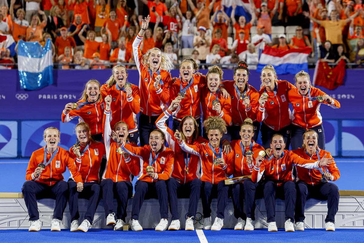 Women’s hockey gold medal winners Netherlands celebrate during the medal ceremony. 