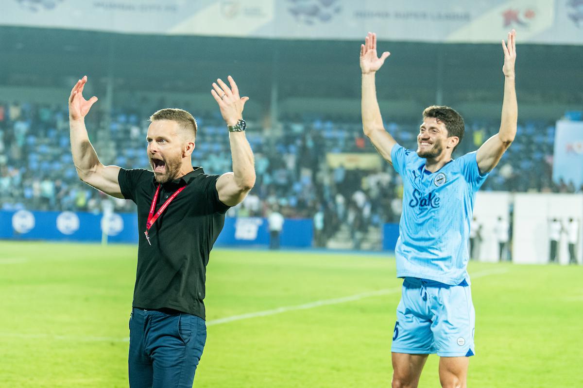 Petr Kratky Head Coach of Mumbai City FC celebrates a win against Bengaluru FC in the Indian Super League (ISL) 2023-24 match at the Mumbai Football Arena